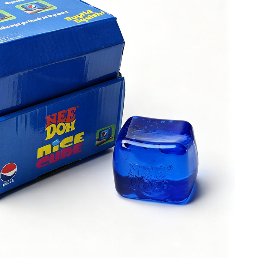A blue translucent cube-shaped needoh squish, soft and stretchy