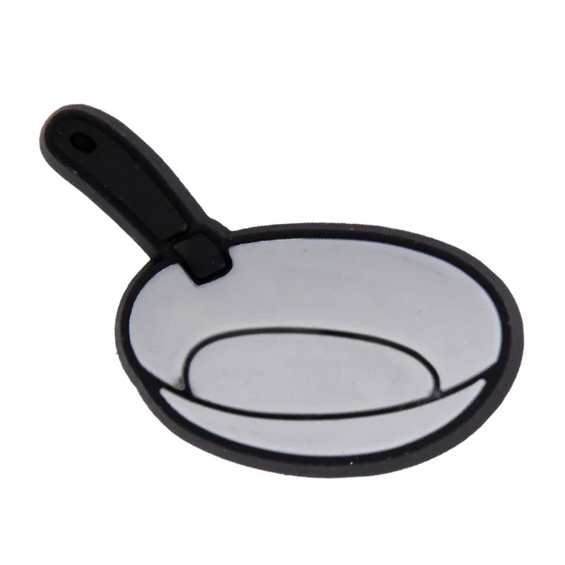 Small frying pan with a black handle on a white background