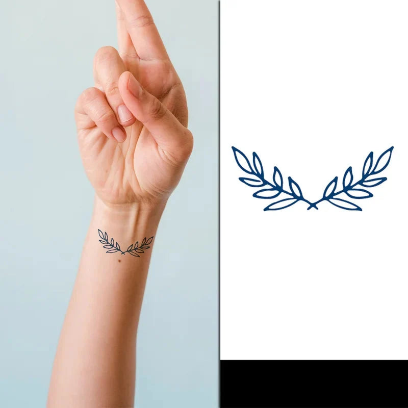 Olive Branches mini semi-permanent tattoo on a womans wrist