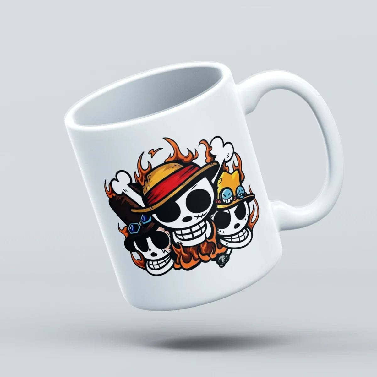 A white ceramic coffee mug featuring a cartoon graphic of three skulls wearing straw hats with flames, floating against a light gray background.