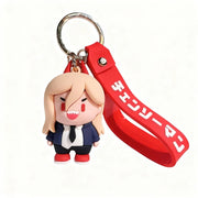 Keychain with a cartoon character and red strap on a white background