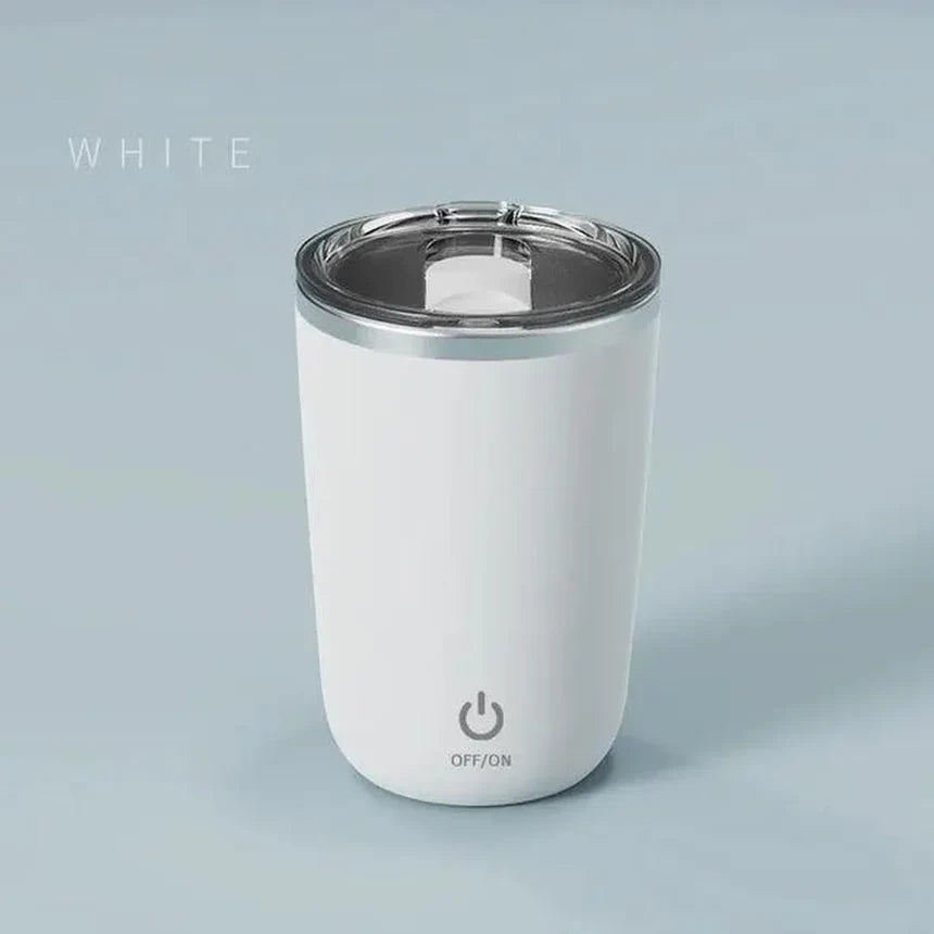Magnetic rechargeable self-stirring mug in pastel white color