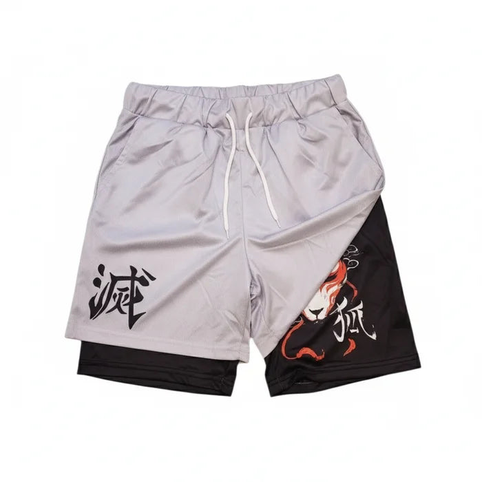 Two pairs of shorts, one gray and one black with a fox design, on a white background.