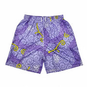 Purple mesh shorts with yellow patterns on a white background