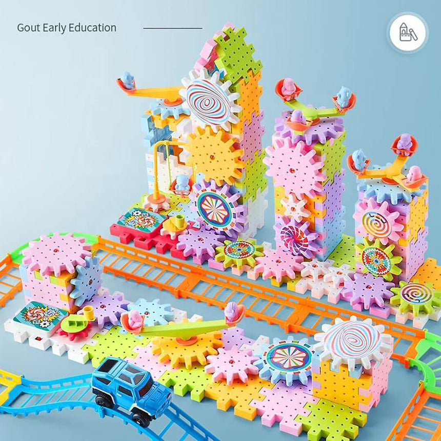 Colorful toy gear set with train tracks and magnetic blocks.