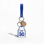 Keychain with basketball jersey and ball design on a white background