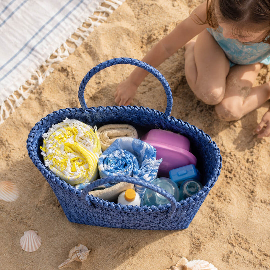 Fashionable navy woven bag for beach and picnic