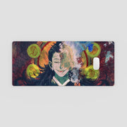 computer mouse with artistic design of a man's face and colorful abstract elements mousepad on a light gray background