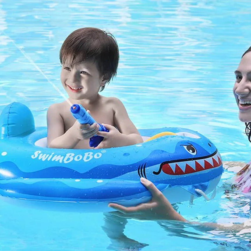 Shark-themed swim float designed for children aged 1 to 4 years.