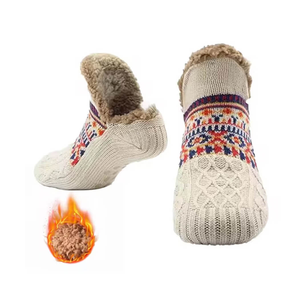 Pair of knitted beige socks with colorful pattern and fur lining for women