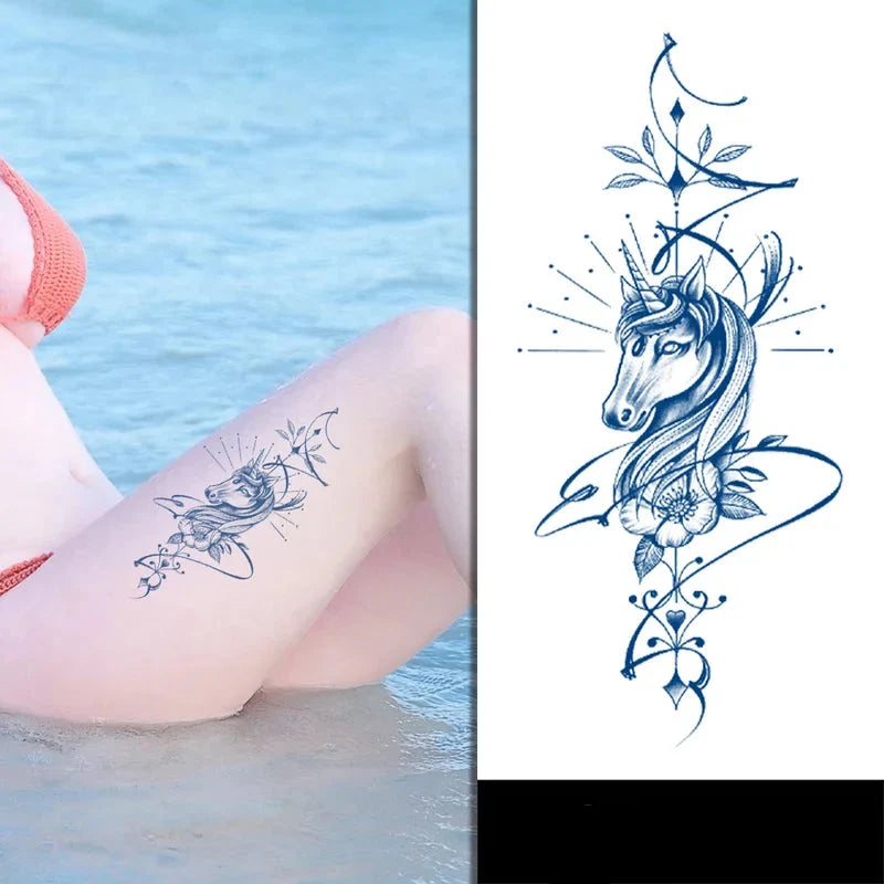 Unicorn tattoo design on a person's leg with water and pink float in the background