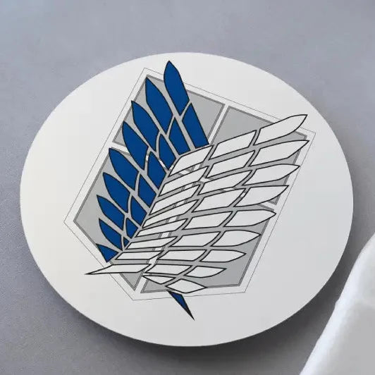A round MDF coaster with a printed design of the Scouting Legion's wings from the anime Attack on Titan.