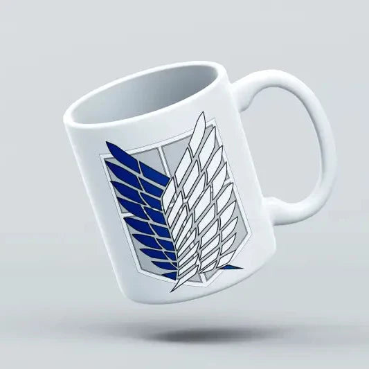 A white ceramic mug with a blue and gray wings of freedom design, flipped upside down on a plain background.