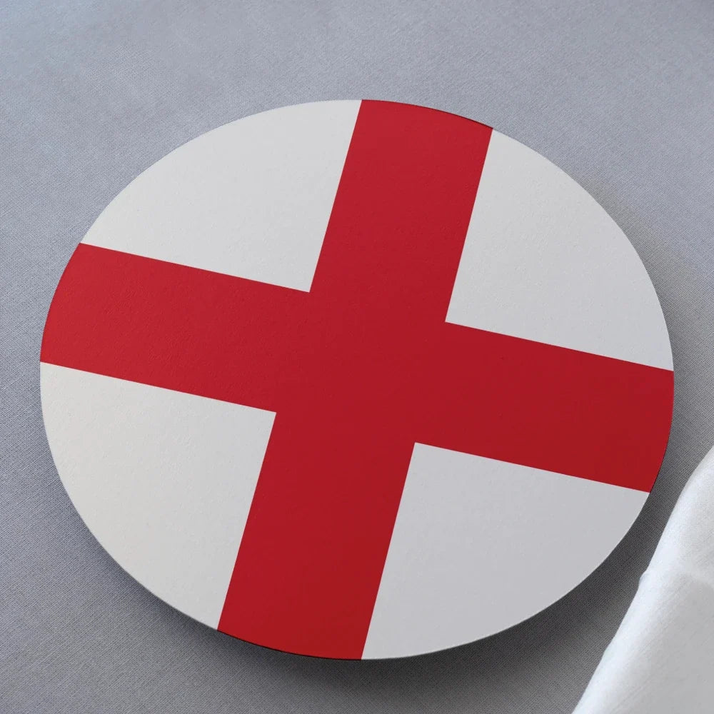 Round coaster with a red cross on a white background
