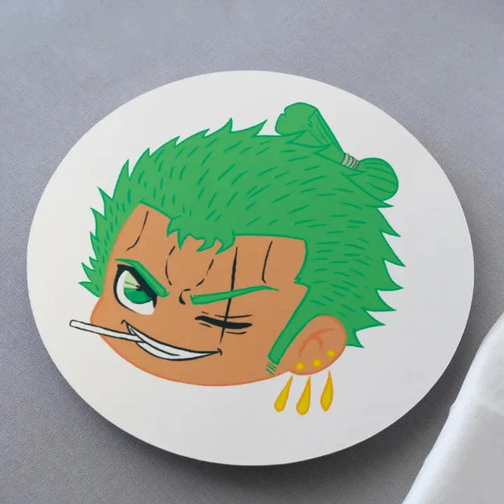 A round MDF coaster featuring a vibrant illustration of the anime character Roronoa Zoro from One Piece.